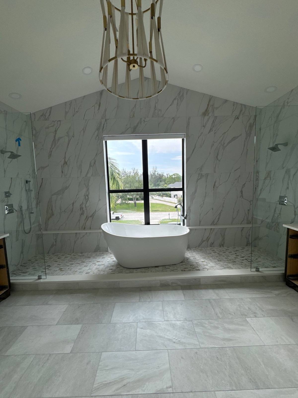 Marble master bath with freestanding tub